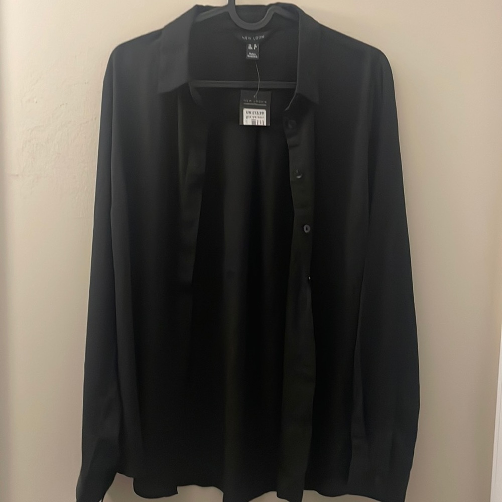 Black button up shirt, never worn.